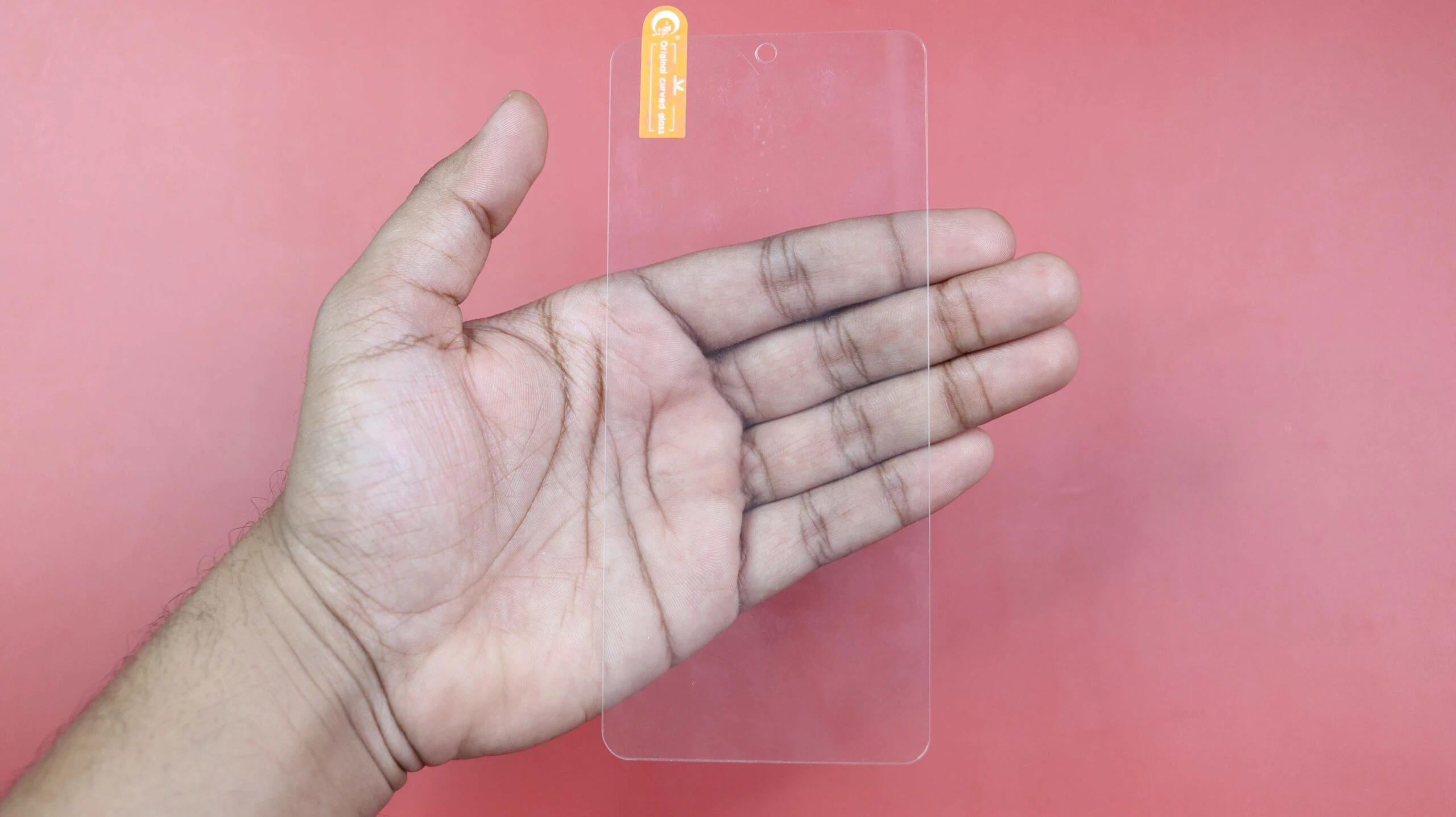 tempered glass in hand scaled